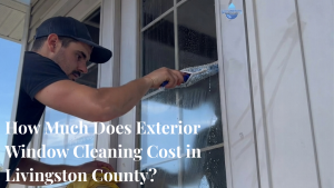 Professional exterior window cleaning on a two-story home in Livingston County Michigan