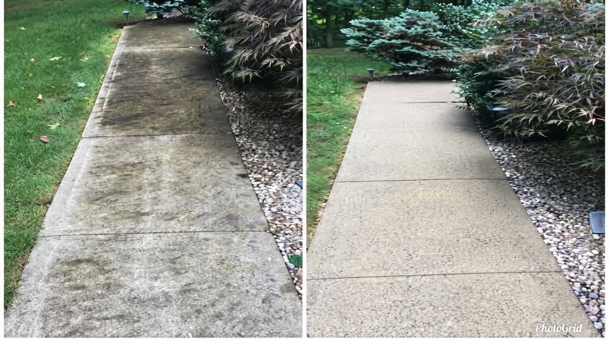 Standard two car concrete driveway after pressure washing in Howell Michigan